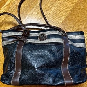 Kim Rogers black and gold bag